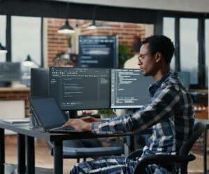 African business owner researching with AI tools to make better business decisions