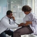 Doctor with patient