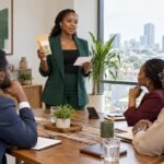 Nigerian entrepreneur presenting a packaged product during a short business pitch